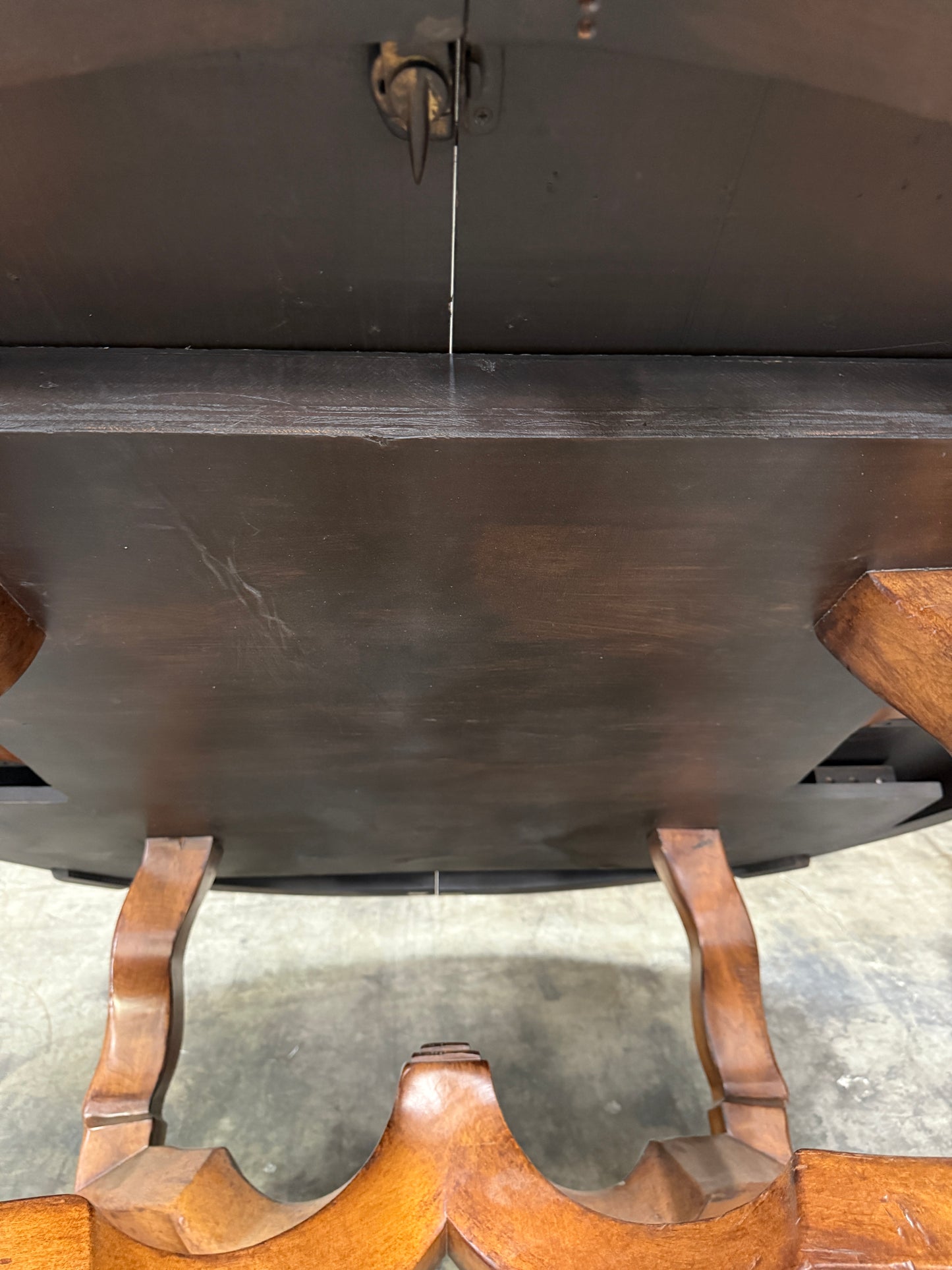 Custom Early Spanish Style Walnut Dining Table – Round to Oval with Leaves, Carved Stretcher Base, 107″L × 60″W × 30″H