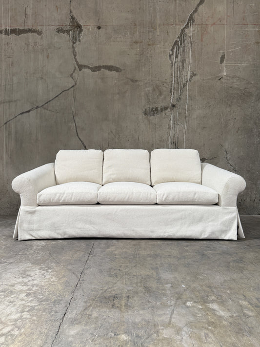 Custom Designer Sourced White Sofa – Rolled Arm, Skirted Base, Flawless Condition