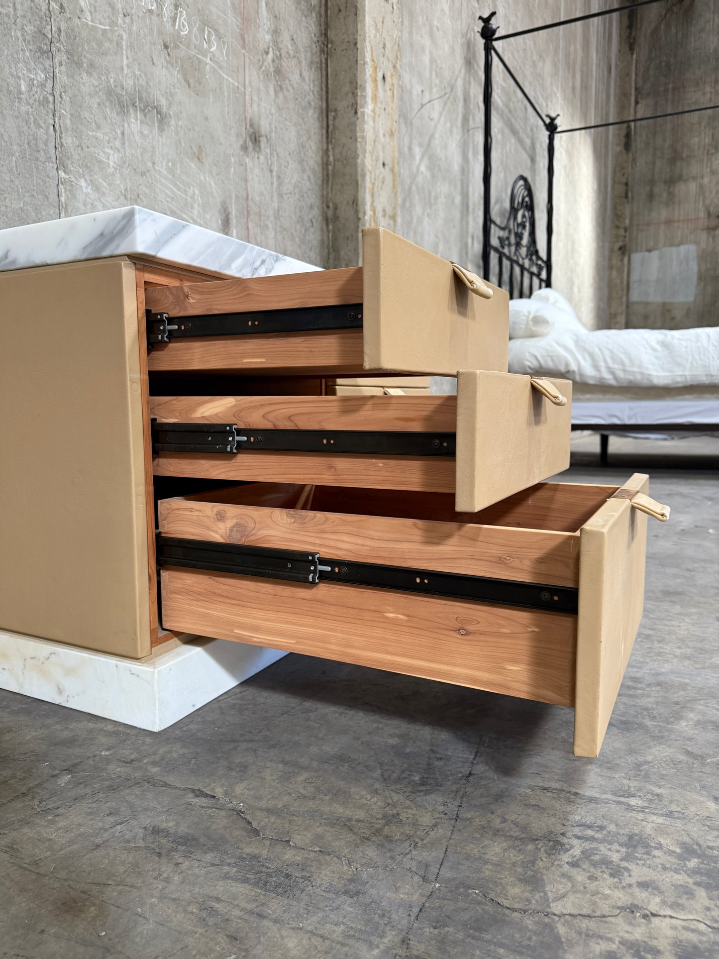 1980s Leather-Clad Six-Drawer Chest on Marble Plinth – In the Manner of Karl Springer