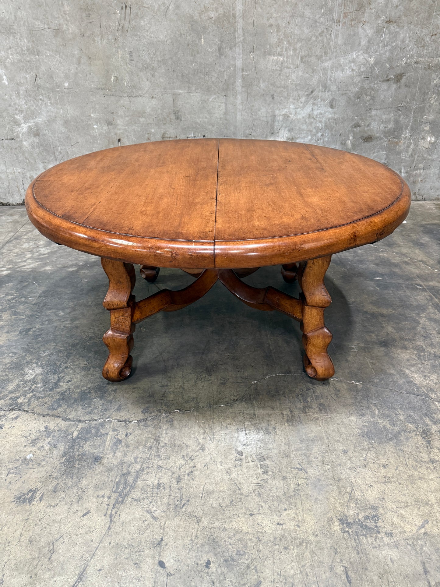 Custom Early Spanish Style Walnut Dining Table – Round to Oval with Leaves, Carved Stretcher Base, 107″L × 60″W × 30″H